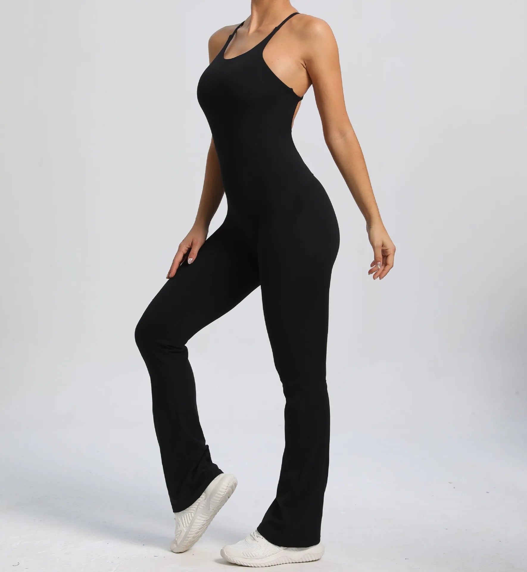 alt
Cross V - ryggscrunch jumpsuit - Gymfit